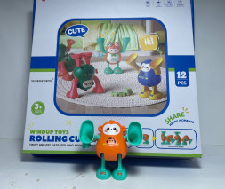 Обезьянка (пласт.) Заводилка (Оранжевый)