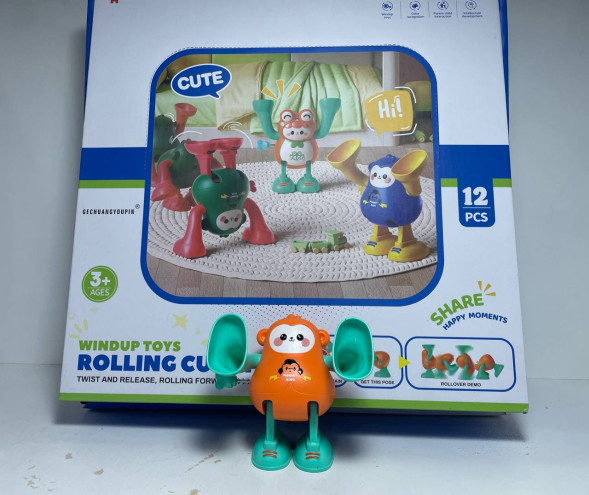 Обезьянка (пласт.) Заводилка (Оранжевый)